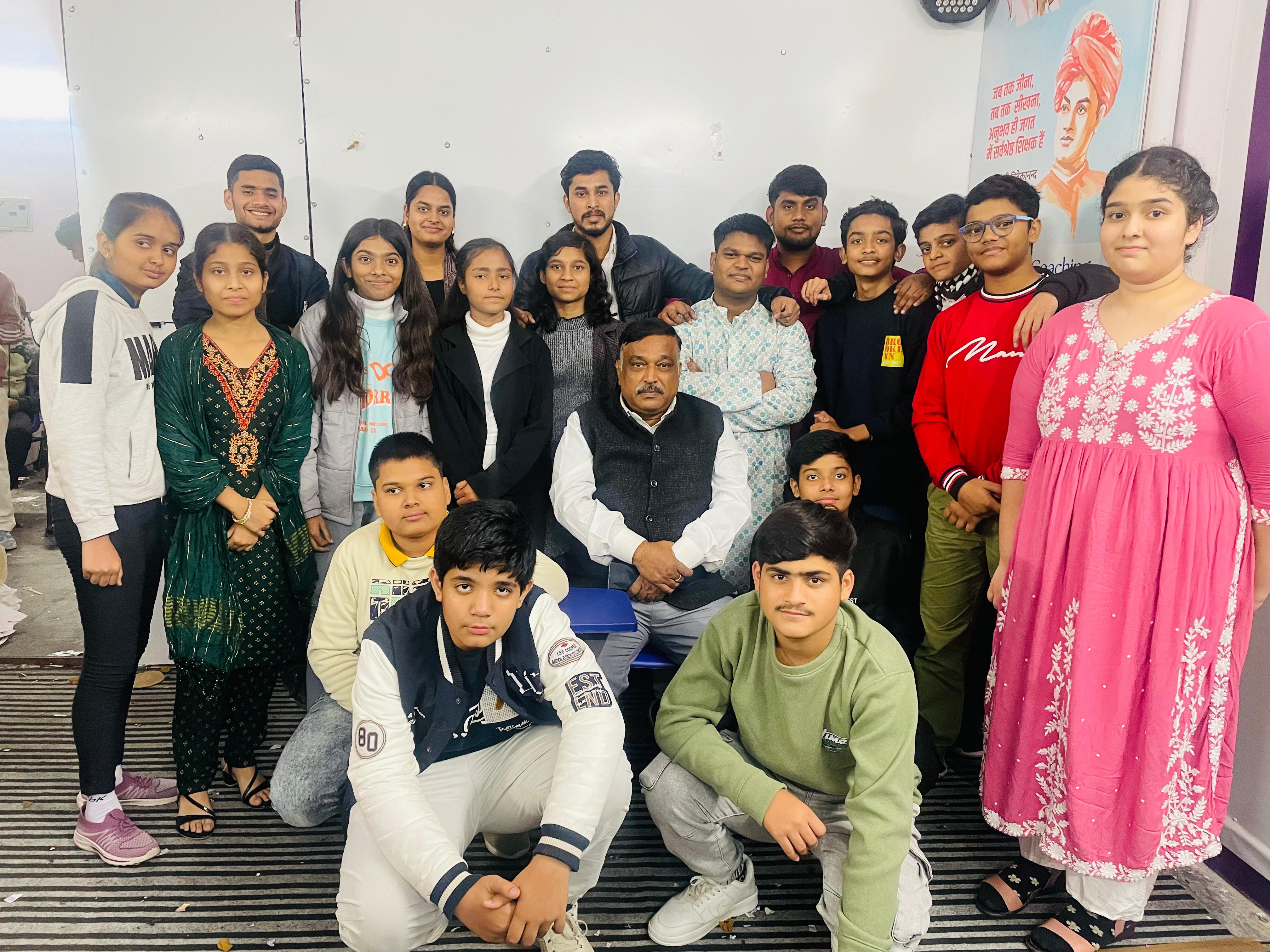 Roy's Coaching Classes Delhi — Students with Faculty Celebration